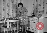 Image of housewife in 1930s United States USA, 1938, second 22 stock footage video 65675041917