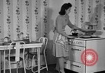 Image of housewife in 1930s United States USA, 1938, second 23 stock footage video 65675041917