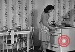 Image of housewife in 1930s United States USA, 1938, second 25 stock footage video 65675041917