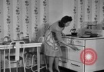 Image of housewife in 1930s United States USA, 1938, second 27 stock footage video 65675041917
