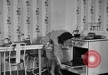 Image of housewife in 1930s United States USA, 1938, second 28 stock footage video 65675041917