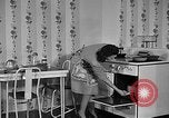 Image of housewife in 1930s United States USA, 1938, second 29 stock footage video 65675041917