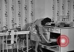 Image of housewife in 1930s United States USA, 1938, second 30 stock footage video 65675041917