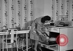 Image of housewife in 1930s United States USA, 1938, second 33 stock footage video 65675041917