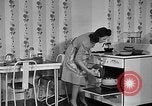 Image of housewife in 1930s United States USA, 1938, second 34 stock footage video 65675041917