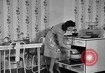 Image of housewife in 1930s United States USA, 1938, second 35 stock footage video 65675041917