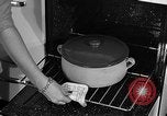 Image of housewife in 1930s United States USA, 1938, second 40 stock footage video 65675041917
