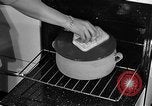 Image of housewife in 1930s United States USA, 1938, second 41 stock footage video 65675041917