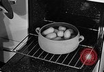 Image of housewife in 1930s United States USA, 1938, second 42 stock footage video 65675041917