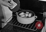 Image of housewife in 1930s United States USA, 1938, second 43 stock footage video 65675041917