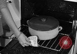 Image of housewife in 1930s United States USA, 1938, second 45 stock footage video 65675041917