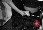 Image of housewife in 1930s United States USA, 1938, second 46 stock footage video 65675041917