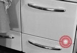 Image of housewife in 1930s United States USA, 1938, second 49 stock footage video 65675041917