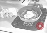 Image of housewife in 1930s United States USA, 1938, second 50 stock footage video 65675041917
