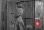 Image of dressing gown United States USA, 1938, second 25 stock footage video 65675041918