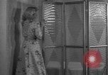Image of dressing gown United States USA, 1938, second 26 stock footage video 65675041918