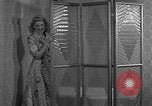 Image of dressing gown United States USA, 1938, second 27 stock footage video 65675041918