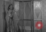 Image of dressing gown United States USA, 1938, second 28 stock footage video 65675041918