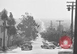 Image of La Cienega Blvd, City Hall, and Hollywood Memorial Park Cemetery Los Angeles California USA, 1950, second 25 stock footage video 65675041957
