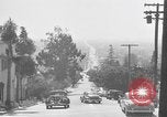 Image of La Cienega Blvd, City Hall, and Hollywood Memorial Park Cemetery Los Angeles California USA, 1950, second 26 stock footage video 65675041957