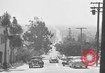 Image of La Cienega Blvd, City Hall, and Hollywood Memorial Park Cemetery Los Angeles California USA, 1950, second 27 stock footage video 65675041957