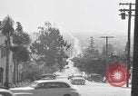 Image of La Cienega Blvd, City Hall, and Hollywood Memorial Park Cemetery Los Angeles California USA, 1950, second 30 stock footage video 65675041957