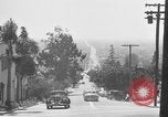 Image of La Cienega Blvd, City Hall, and Hollywood Memorial Park Cemetery Los Angeles California USA, 1950, second 31 stock footage video 65675041957