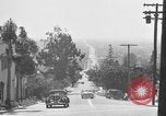 Image of La Cienega Blvd, City Hall, and Hollywood Memorial Park Cemetery Los Angeles California USA, 1950, second 32 stock footage video 65675041957