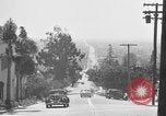 Image of La Cienega Blvd, City Hall, and Hollywood Memorial Park Cemetery Los Angeles California USA, 1950, second 33 stock footage video 65675041957