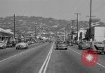 Image of La Cienega Blvd, City Hall, and Hollywood Memorial Park Cemetery Los Angeles California USA, 1950, second 35 stock footage video 65675041957