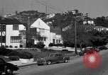 Image of La Cienega Blvd, City Hall, and Hollywood Memorial Park Cemetery Los Angeles California USA, 1950, second 45 stock footage video 65675041957