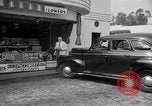 Image of La Cienega Blvd, City Hall, and Hollywood Memorial Park Cemetery Los Angeles California USA, 1950, second 62 stock footage video 65675041957