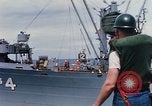 Image of USS Pollux unrep of USS Constellation Gulf of Tonkin Vietnam, 1967, second 4 stock footage video 65675042001
