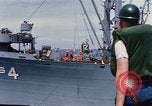 Image of USS Pollux unrep of USS Constellation Gulf of Tonkin Vietnam, 1967, second 10 stock footage video 65675042001
