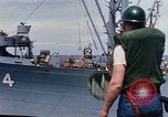 Image of USS Pollux unrep of USS Constellation Gulf of Tonkin Vietnam, 1967, second 12 stock footage video 65675042001