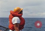 Image of USS Pollux unrep of USS Constellation Gulf of Tonkin Vietnam, 1967, second 32 stock footage video 65675042001