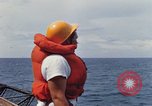 Image of USS Pollux unrep of USS Constellation Gulf of Tonkin Vietnam, 1967, second 33 stock footage video 65675042001