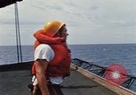 Image of USS Pollux unrep of USS Constellation Gulf of Tonkin Vietnam, 1967, second 35 stock footage video 65675042001