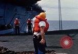 Image of USS Pollux unrep of USS Constellation Gulf of Tonkin Vietnam, 1967, second 37 stock footage video 65675042001