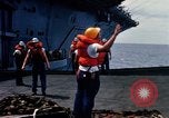 Image of USS Pollux unrep of USS Constellation Gulf of Tonkin Vietnam, 1967, second 40 stock footage video 65675042001