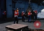 Image of USS Pollux unrep of USS Constellation Gulf of Tonkin Vietnam, 1967, second 49 stock footage video 65675042001