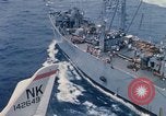 Image of USS Pollux and USS Constellation Gulf of Tonkin Vietnam, 1967, second 17 stock footage video 65675042002