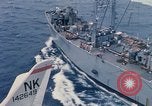 Image of USS Pollux and USS Constellation Gulf of Tonkin Vietnam, 1967, second 21 stock footage video 65675042002