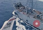 Image of USS Pollux and USS Constellation Gulf of Tonkin Vietnam, 1967, second 22 stock footage video 65675042002