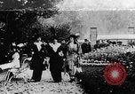 Image of Three women strolling in a park Paris France, 1907, second 1 stock footage video 65675042050