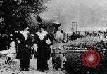 Image of Three women strolling in a park Paris France, 1907, second 4 stock footage video 65675042050