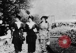 Image of Three women strolling in a park Paris France, 1907, second 5 stock footage video 65675042050