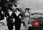 Image of Three women strolling in a park Paris France, 1907, second 6 stock footage video 65675042050