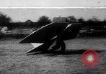 Image of Man wearing wings and a tail United States USA, 1920, second 1 stock footage video 65675042060