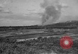 Image of Japanese civilians during invasion of Aguni Jima Okinawa Ryukyu Islands, 1945, second 6 stock footage video 65675042088